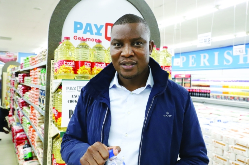 Elliot Moshoke in a Payless store